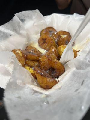 Fried bananas with condensed milk, there were a couple that are missing from the tray already when I took this.  Soooo good!