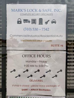 Window sign showing hours