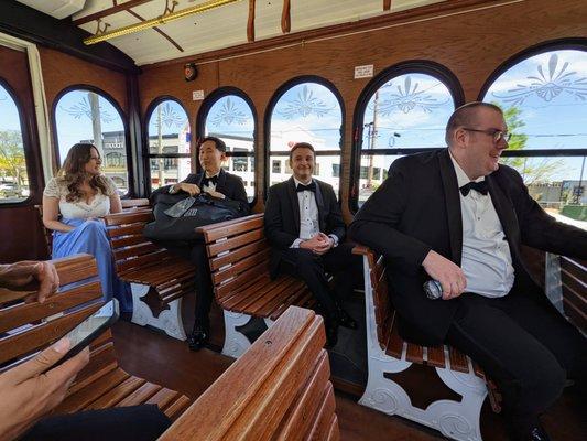 We chartered the 32-seat white trolley, The Swan, for our wedding. Riding down Peachtree Road to the Swan House, Atlanta History Center.