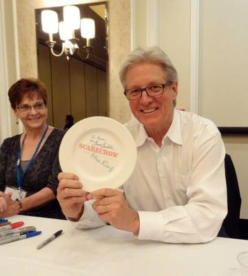 Bruce Boxleitner signing my friend's plate at the Scarecrow and Mrs. King 30th Anniversary. This is BEFORE firing the plate.