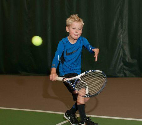 Tennis lessons at Sunset Athletic Club.