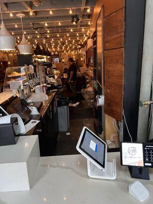 Employee drops paper towels and leaves on floor.