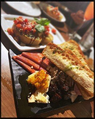 Meat and cheese platter and bruchetta