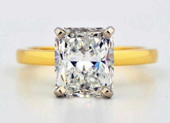 2 carat cushion cut diamond set in 18K yellow gold