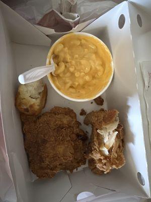 2 pieces chicken with mac and cheese and a biscuit