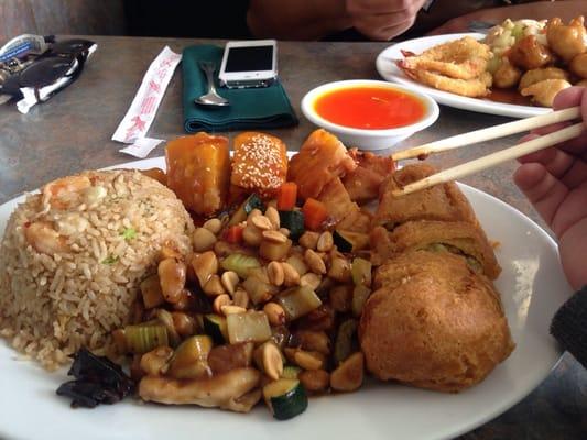 This was king pao chicken, orange chicken, shrimp fried rice and a massive eggroll ... this is enough to easily fees two people!