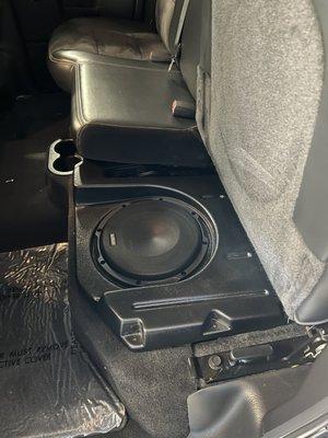 Audison hidden subwoofer.