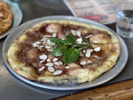 Blackberry Bomb dessert pizza  Olive Oil Base, Ricotta cheese,Blackberry Jam, Fresh mint, Honey and sliced almonds!!!