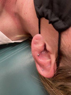 Top of piercing.