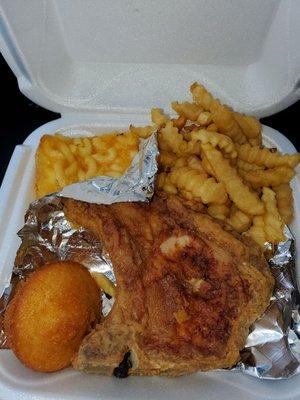 Pork chop plate (hold the gravy) french fries, mac & cheese, corn muffin