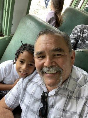 Riding the train with my Grandson