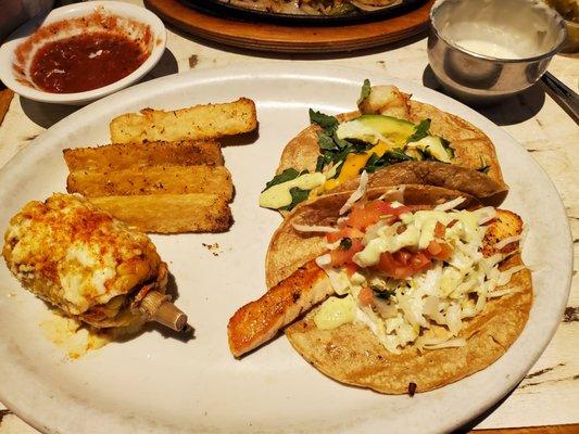 Shrimp and salmon tacos, yuca fries and Mexican corn