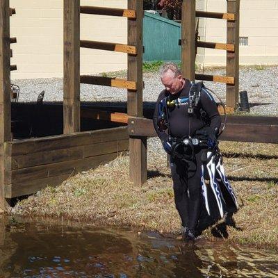 Carson prepares to enter the lake for my drone recovery