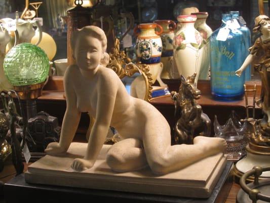 nude sculpture, vases and deco lamp.