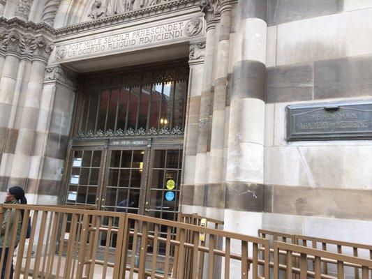 Cafe entrance is just off Fifth Ave, ON 103rd Street. This is the entrance to the building. Cafe is inside.