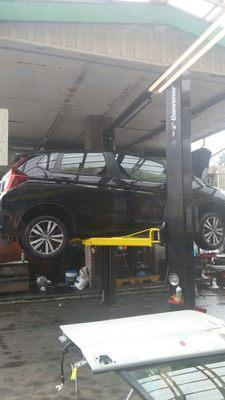 Our car getting a check up before our cross country trip