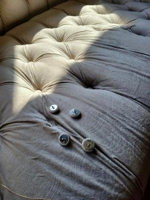 Furniture upholstery: Repair a sofa popped and broken buttons