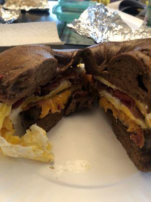 The Beast!!!!  Sausage, Bacon, 4 Eggs and Cheddar on toasted Pumpernickel