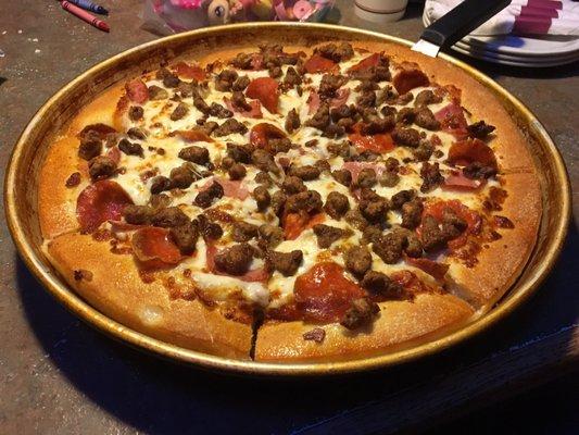 A Large, Deep Dish Meat Lover's Pizza