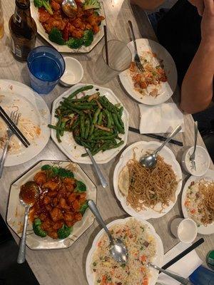 Pork green beans, sweet and sour chicken, honey bbq rice, pot stickers and chicken chow mein.