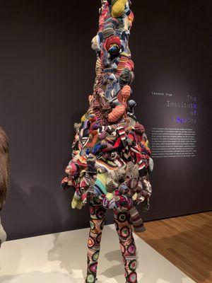 Statue made of a collage of woven fabrics