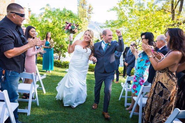 Us on our wedding day with perfectly fitting attire thanks to Liz & team. Thank you for the perfect alterations & great customer service!