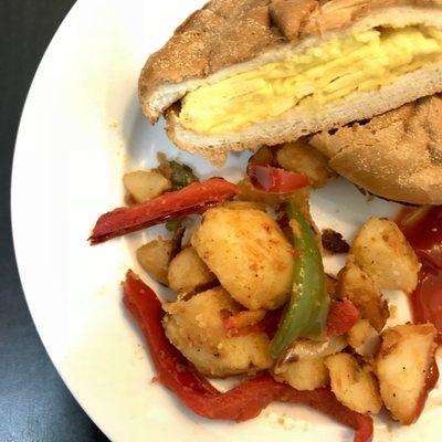 Egg and Cheese Sandwich with a side of Home Fries.