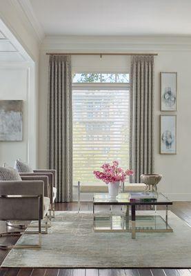 Bold custom drapery with soft, subtle Silhouette® Window Shades create the perfect atmosphere with all the lighting and privacy options.