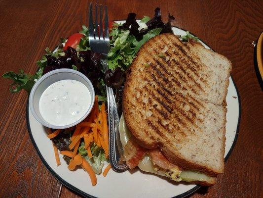 Guac star sandwich with side salad