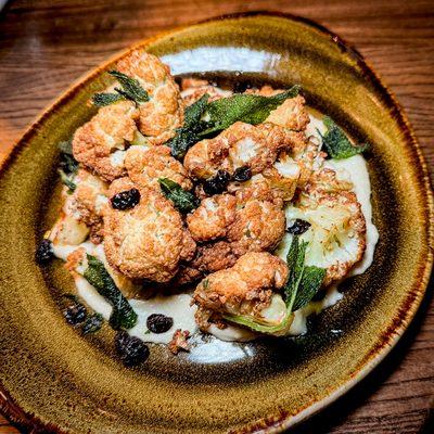 Fried Cauliflower, sumac, currants, sage, green curry oil, ajo blanco