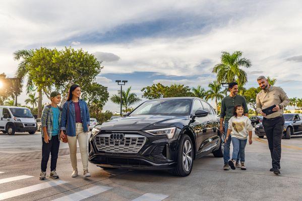 Family outside with there New Audi at Audi Pembroke Pines