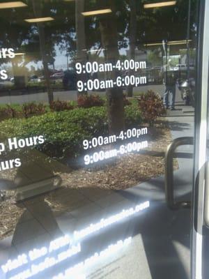 Bank hours posted on front door