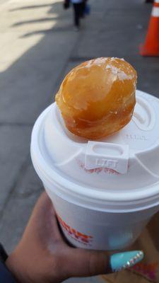 Lg coffee and a glazed munchkin... so shiny