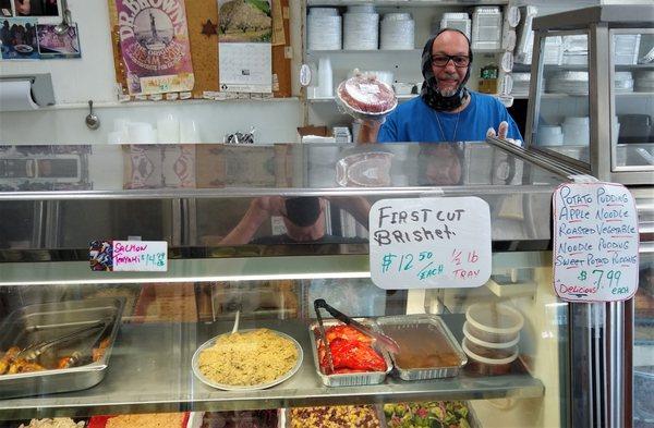 Alfie, the engaging and hard working store owner.