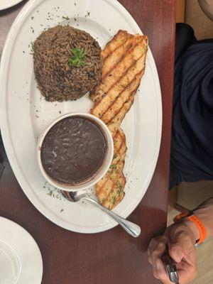 Chicken Churrasco with a side of Moro and black beans