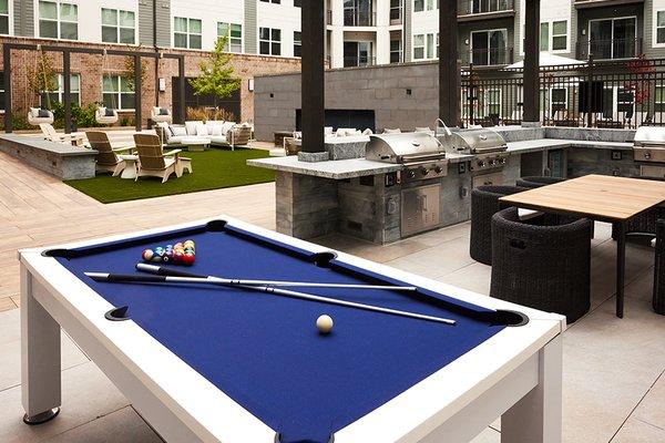 Built-in grills with dining area and billiards table