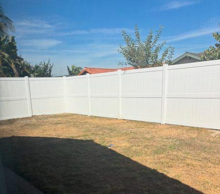 beautiful fence replaced a rotting old fence. Next up, green turf to complete the beautiful look!