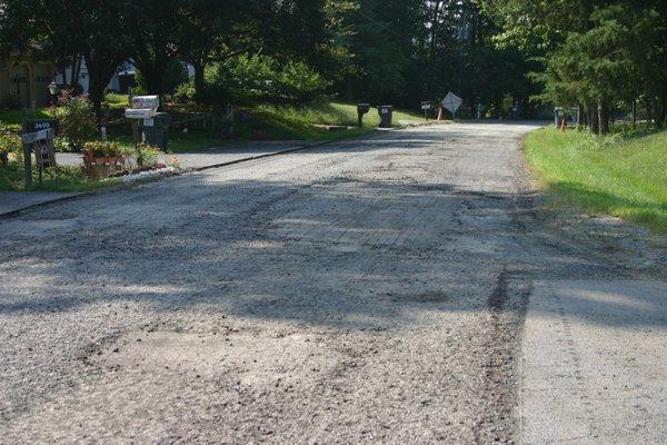 Unfortunately, it gets worse before it gets better. We had to mill the street to prepare for the new surface.