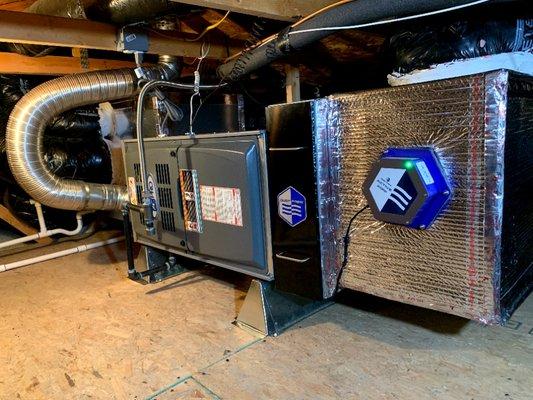 A new furnace and AC coil installed with a 4" carbon media filter and a MicroPure Active air purifier.