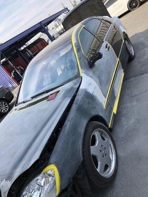 A client's 2001 Mercedes S55 AMG being prepped for paint.