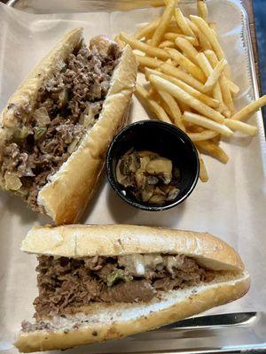 Supreme cheesesteak + fries. Canned mushrooms, yuck.