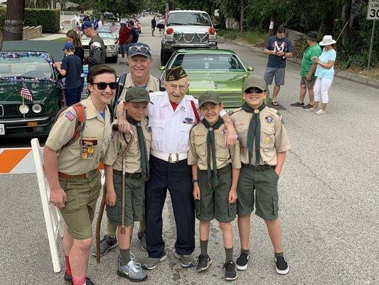 Grand Marshal Bud Switzer and banner carrier Boy Scouts from Troop 373.  Bud was a Scout in Troop 373 a few years ago!