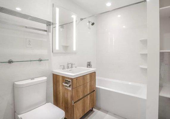 All apartments have new marble bathrooms with granite banjo countertops and oversized medicine cabinet.