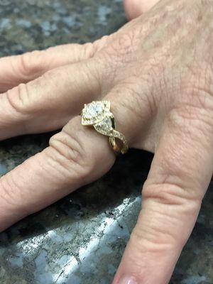 She loves her new ring... reset her marquise into a new mounting