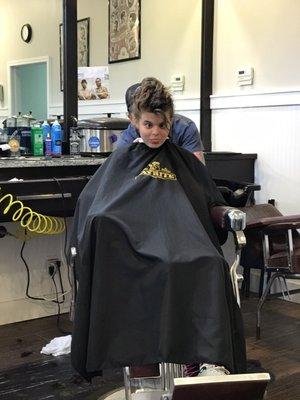 My daughter's true self comes out while she's getting her hair trimmed!