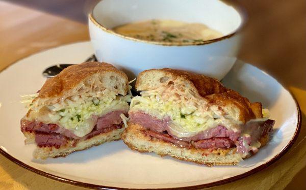 Homemade Corned Beef on salt bread, with fixings and mashed potatoes with gravy