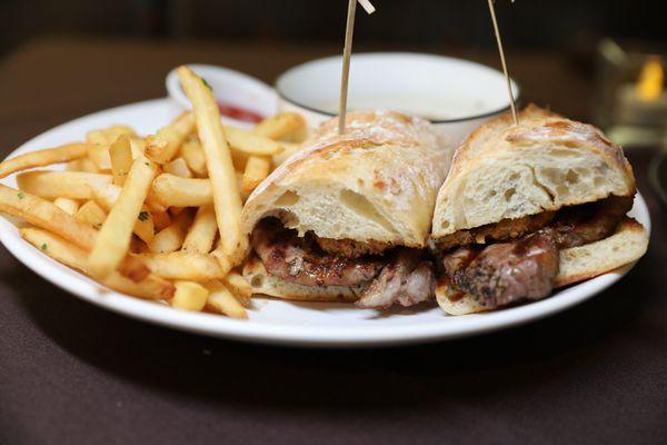 NY Strip Sandwich w/horseradish aioli, house made crispy fried onions and au jus.