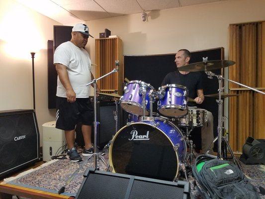 Beck teaching drummer-friend on provided kit at West One Studios