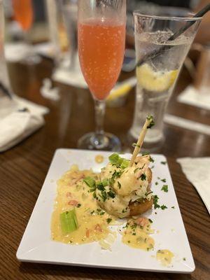 Passion fruit mimosa and shrimp grit cake