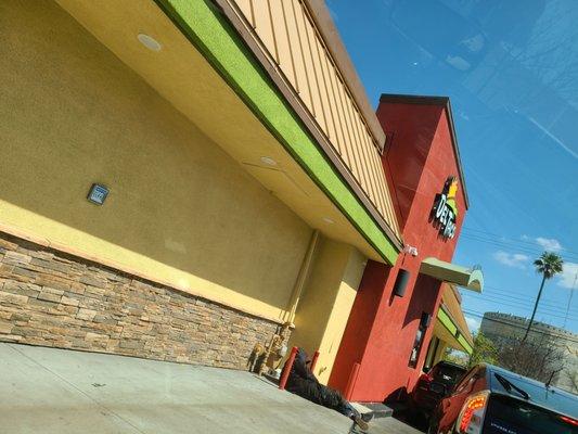 Someone often lays near the drive thru window..